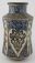 oeuvre OA 4091 Louvre vase de forme cylindrique à panse cintrée (albarelle) à décor de palmettes Syrie Égypte