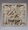 Plaque représentant une scène d’inspiration égyptienne : deux génies coiffés de la double couronne pharaonique (pschent)